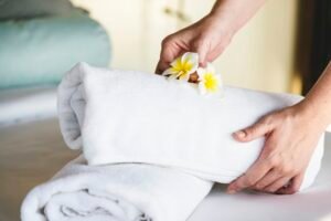 Housekeeper cleaning a hotel room